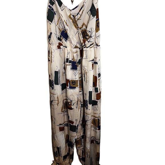 NWOT sleeveless jumpsuit. - Picture 1 of 8